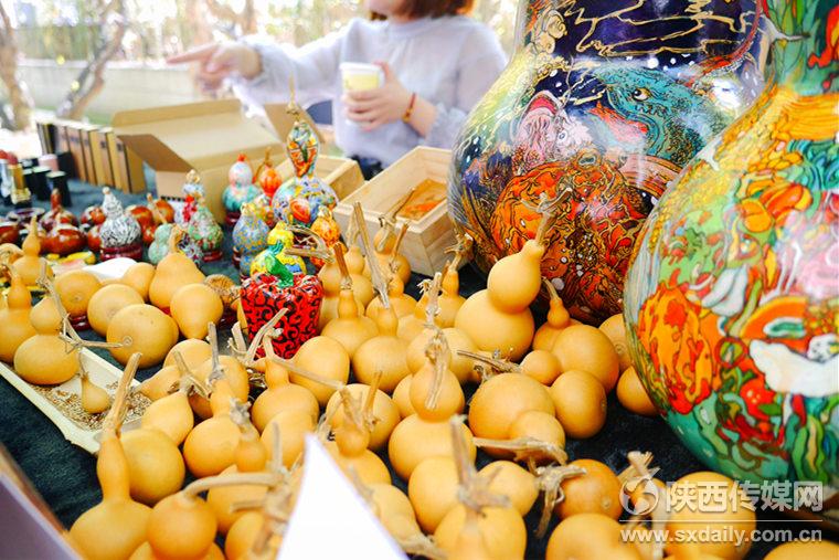 ���L������J